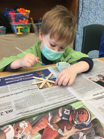 Painting snowflakes.
